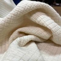Tissu gaufré laine coton écru