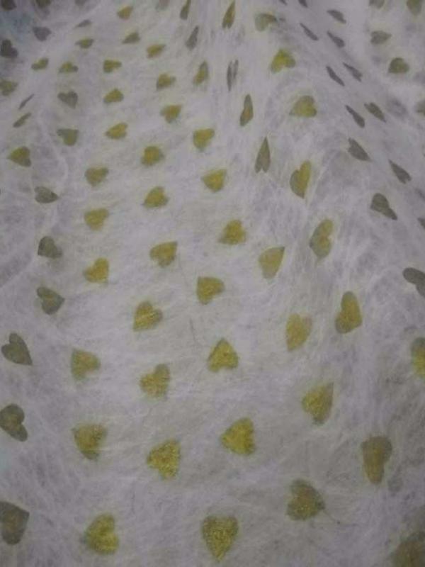 Tissu non tisse blanc imprime c ur dore