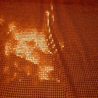 Tissu orange a paillettes ronde orange