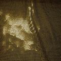 Tissu vieil or a paillettes ronde dore