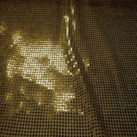 Tissu vieil or a paillettes ronde dore