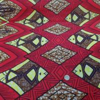 vente de tissu wax bordeaux imprimé poissons ton noir ,jaune et marron