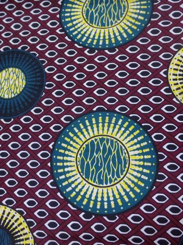 Tissu wax bordeaux imprime ton bleu noir jaune