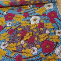 Tissu wax imprime fleurs ton bordeaux bleu safran blanc