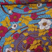 vente tissu wax imprimé fleurs ton bordeaux ,bleu ,safran ,blanc en ligne
