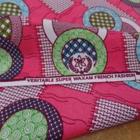 vente de tissu wax rose a motifs rond ton blanc ,bleu ,vert ,bordeaux