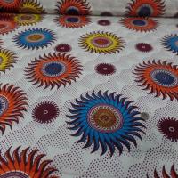 vente de tissu wax blanc imprimé soleil ton bordeaux ,orange ,jaune ,bleu a Marseille