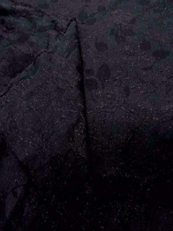 Toile legere noire faconne tweed et brode