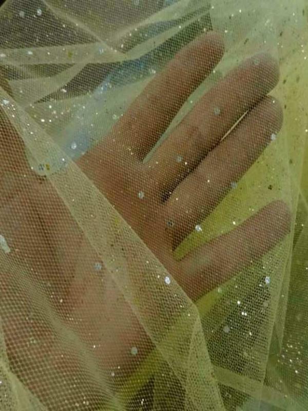 Tulle a paillettes jaune dore