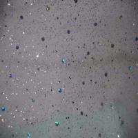 Tulle blanc a paillettes multicolore