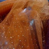 Tulle vert orange a paillettes