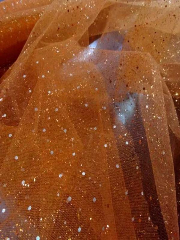 Tulle vert orange a paillettes