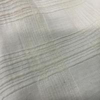 Velours souple façonné écrue motifs carreaux