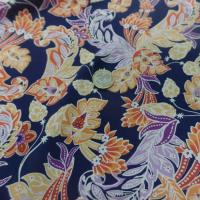tissu Viscose bleu nuit imprimé fleurs ton jaune, orange