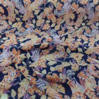 tissu Viscose bleu nuit imprimé fleurs ton jaune, orange, prune en ligne