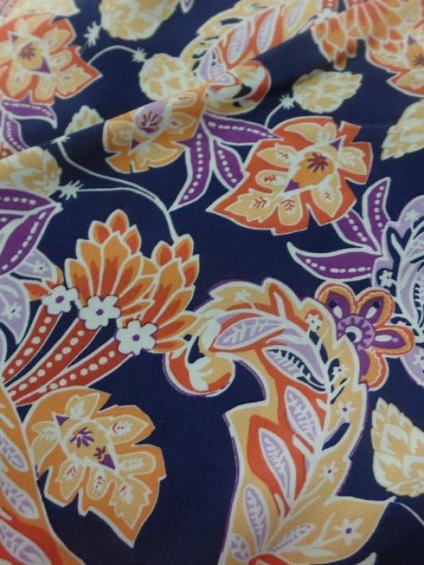 tissu Viscose bleu nuit imprimé fleurs ton jaune, orange, prune en ligne