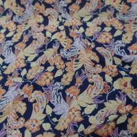 Viscose bleu nuit imprimé fleurs ton jaune, orange, prune