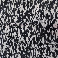 tissu Viscose imprimé motifs noir et blanc cassé