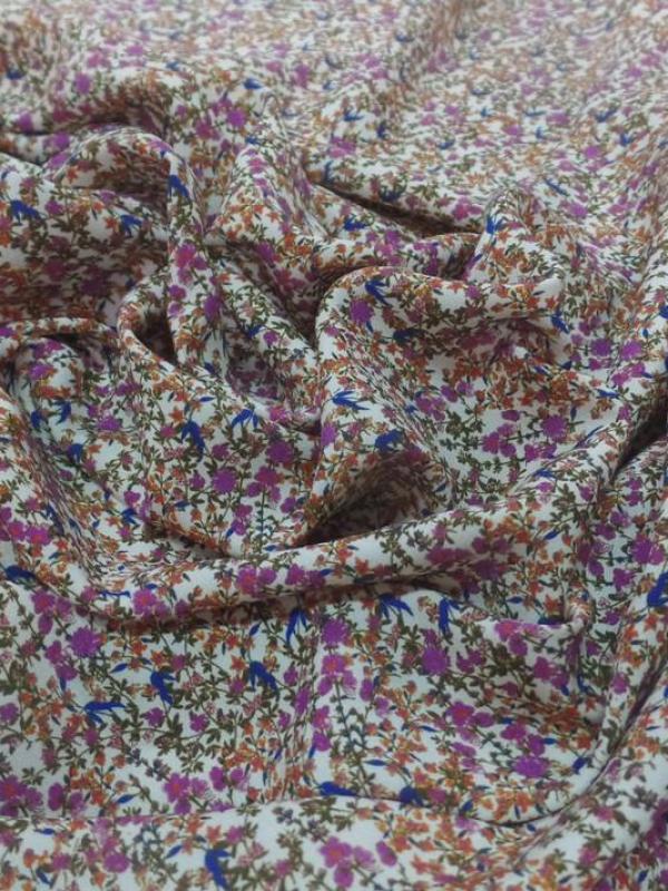Viscose imprimee motifs liberty ton rose orange vert et bleu
