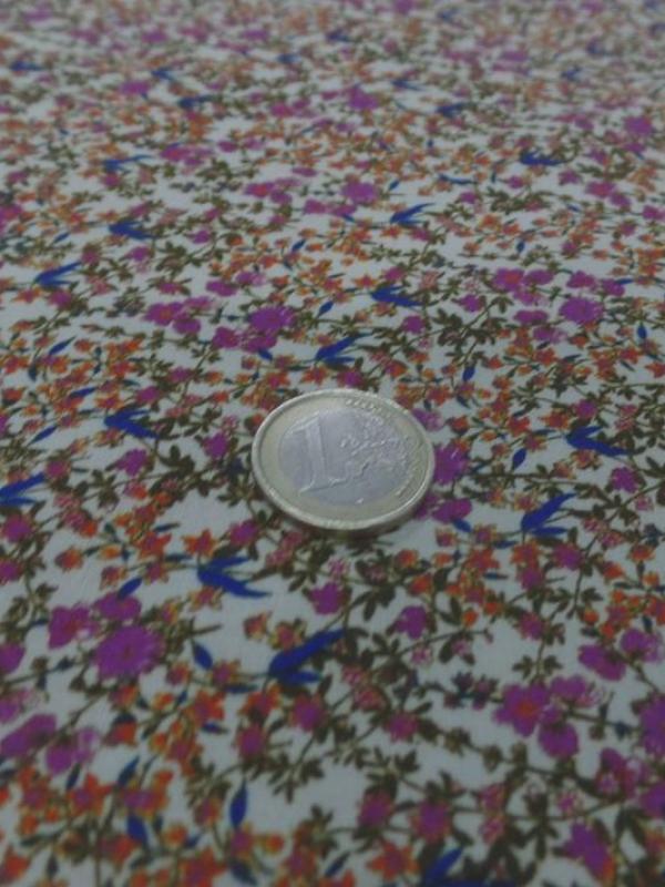 Viscose imprimee motifs liberty ton rose orange vert et bleu