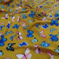 Viscose moutarde fine imprime papillon bleu et rose