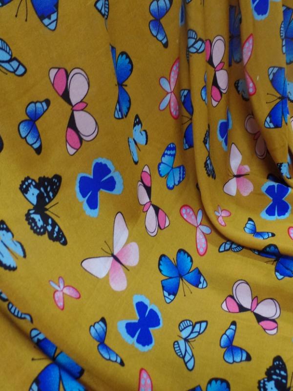 Viscose moutarde fine imprime papillon bleu et rose