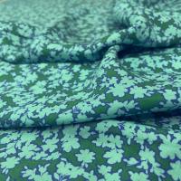 Viscose verte imprime petite fleurs bleu