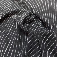 Voile de coton noir façonné bandes blanches