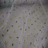 Voile jersey blanc a petites fleurs brodes