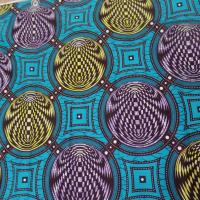 vente de tissu wax bleu turquoise imprimé jaune ,marron et lavande